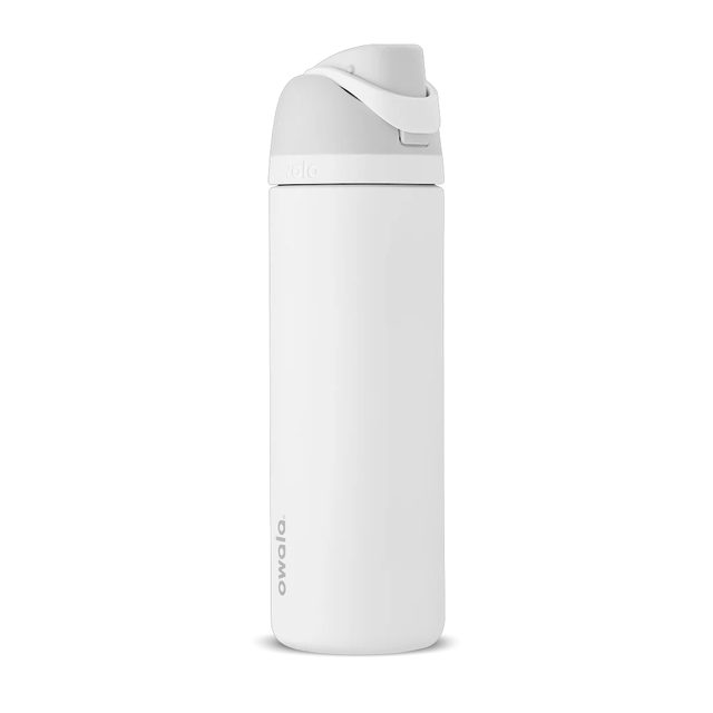 An off-white 24-ounce Owala FreeSip water bottle with a light gray flip lid and carry loop