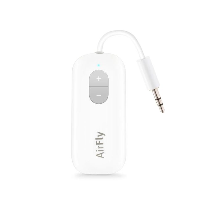 A small white Twelve South AirFly with volume buttons and a short cable ending in a headphone plug