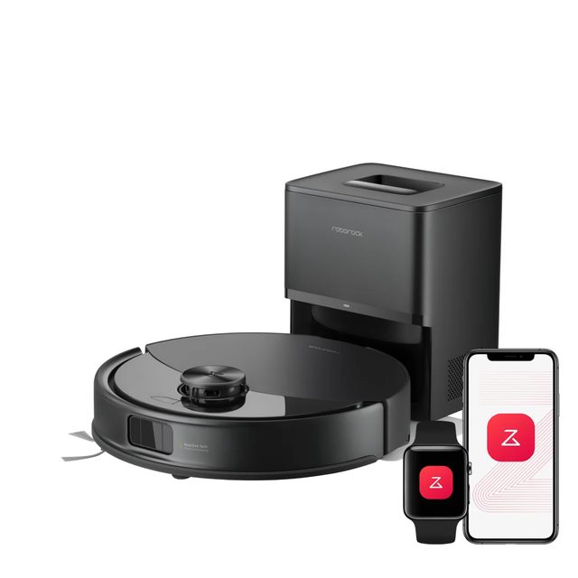 Black Roborock Q10 S5+ robot vacuum in front of its black auto-empty dock, beside a phone and watch showing the Roborock app